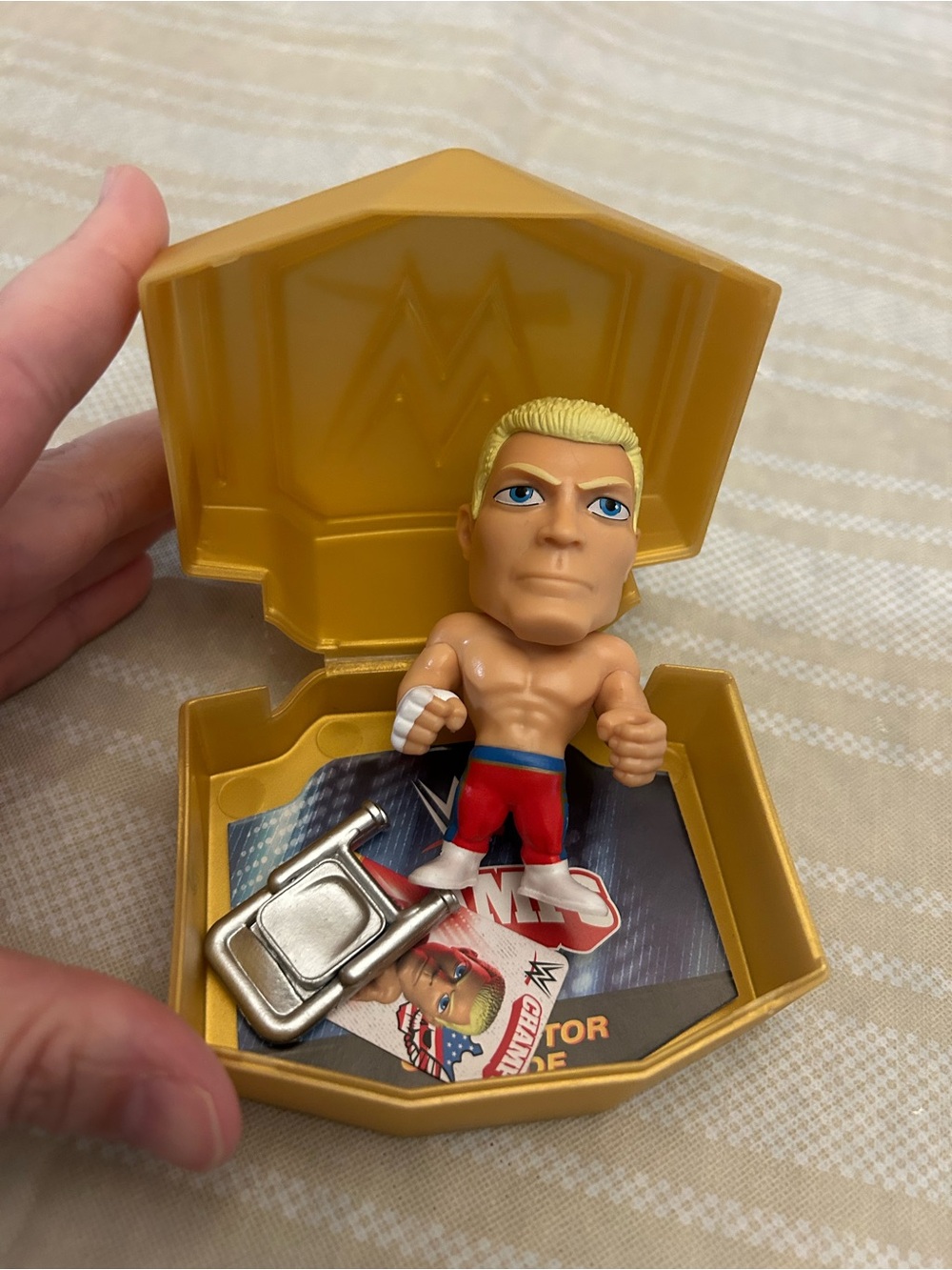 WWE Blonde Wrestler Mini Figure in Gold Case with Red Trunks